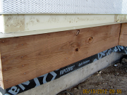 Detail of deck ledger, flashing, foam & lath