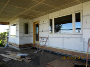 Back of house is wrapped with foam and lath