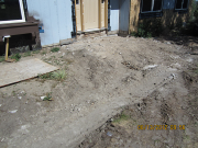 Old front concrete patio is removed