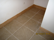 New basement tile & baseboard