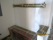All stained woodwork is masked before painting