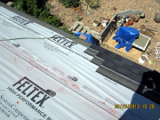 Roof shingles are being installed