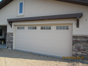 Beams above garage door are installed