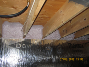 Spray insulation used at rim board in unfinished basement
