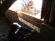 Little wall by old garage door being formed
