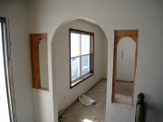 Small arch openings are ready to be closed with drywall