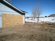 Dirt is graded in new garage
