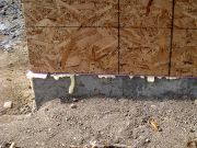 Sill plates are set in foam insulation for air infilteration control