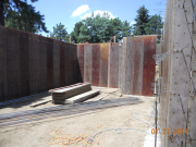 Foundation forms and rebar staged for installation