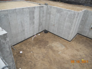 Basement graded and wetted down for slab pour