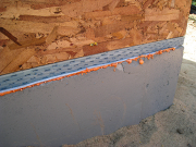 Sill plate installed over spray foam