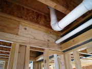 Firestops for dropped ceilings are installed before plumbing