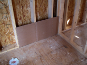 Insulation barrier prior to tub placement