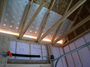 Attic baffles installed to control air movement from soffit