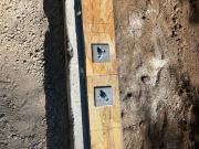 South wall bolts within 10 inches of the end of the plate
