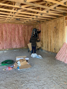 Wall insulation being installed
