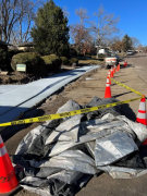 Insulated blankets removed from new sidewalk