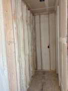 3" in existing window wall (R21) & 2" in 2x6 wall (R14)
