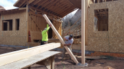 Paul & Carlos raising front porch post