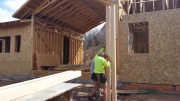 Paul & Carlos installing front porch post