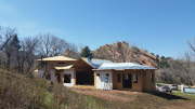 Roofers continuing dry-in with Titanium UDL material