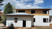 Weather barrier house wrap for advanced air infiltration control