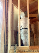 Closed cell foam insulation application in progress