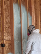 Applying closed cell foam insulation