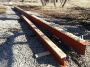 Steel beams plated before crane.jpg