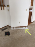 Floor is marked with location of new electric fireplace