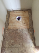 New toilet flange with new OSB flooring in master bath