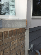 New exterior color sample against brick & trim