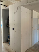 New drywall at entry closet