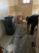 Floor tile demolition in laundry room