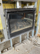 Demolition completed around old fireplace
