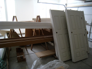 Interior trim & interior doors on racking system for better inventory storage