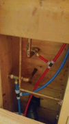 Rough plumbing  connected to the existing supply lines in the ceiling