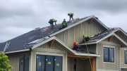 Roofers finishing roofing installation 
