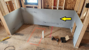 DenShield installed behind tub deck to hold insulation 