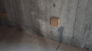 Blocks in basement to hold electric outlets past insulation blankets