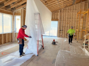 Hanging netting for blown-in insulation