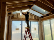 Installing netting protection over skylights