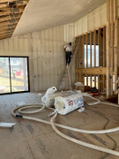 Starting fiberglass blown-in insulation in kitchen walls