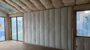 Walls are insulated with 2 inch closed cell foam & blown fiberglass 