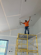 Tape being applied to ceiling