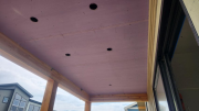 Exterior drywall installed on porch ceiling