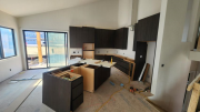 Kitchen cabinets installation in progress