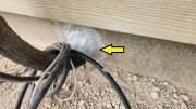 AC condenser line is sealed to foundation 