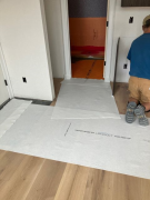 Protective floor covering in place