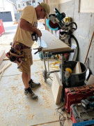 Jim drilling for adjustable closet shelf pin